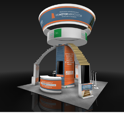 A 3D rendering of a trade show booth. The booth is circular in shape and has a blue and orange color scheme. The top of the booth has a sign that reads "HOMOTORIMPACT.COM" in white letters. Below the sign there is a staircase leading up to the second floor. On the left side of the stairs there are two smaller booths with orange and white text. The booths are located on a gray platform with a black background. There are also two white poles on either side of each booth.