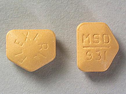 Two rectangular-shaped pills one on the left and the other on the right. The pills are yellow in color and have the letters "MSD 931" written on them in black. The letters are arranged in a hexagonal pattern with the letters on the top and bottom of the pills facing each other. The background is a light grey color.