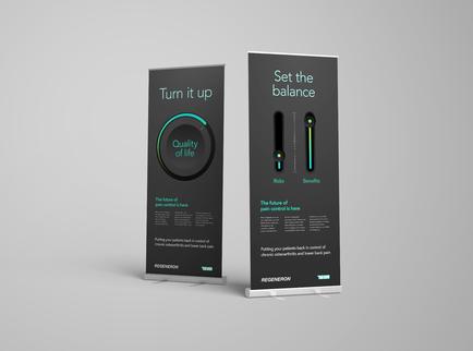 Two roll-up banners with a black background and white text. The banners are standing upright on a grey background. On the left banner there is a circular graphic with the text "Turn it up" and "Quality of life" in white text and on the right banner it reads "Set the balance". Below the graphic there are two icons - one is a green bar graph and the other is a black bar graph. The bar graph shows the percentage of people who have been diagnosed with cancer and the text is in white. The banner also has a brief description of the benefits of setting the balance. The overall design of the banners is modern and minimalist.