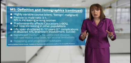 A woman in a purple suit standing in a hallway with a blue background. She is pointing to a slide with text that reads "MS: Definition and Demographics (continued)". The slide is titled "Highly variable course (silent benign malignant) Female to male ratio 3:1: MS is increasing among women. Predominantly affects Cucumbers (90%) but now increasing in other populations. Life span shortened 6-12 years (2-2 complications in disabled MS brainstorm involvement suicide) Significant morbidity for untreated disease can see motor cognitive vocal limitations relapsing and progressive subtypes." The woman appears to be giving a presentation or presentation.