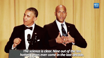 Two men standing behind a podium with microphones. The man on the left is Barack Obama the former president of the United States. He is wearing a black tuxedo with a white shirt and a black bow tie. He has a serious expression on his face and is gesturing with his hands as if he is giving a speech or making a point. On the right is a bald man wearing a suit and tie. The background is a beige curtain. The text on the image reads "The science is clear. Nine out of the ten hottest years ever came in the last decade."
