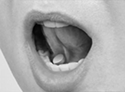 A black and white close-up of a person's mouth. The person's lips are slightly parted and their tongue is visible. In the center of the mouth there is a small white pill which appears to be a medication or medication. The pill is resting on the person's teeth. The background is blurred so the focus is on the mouth and the pill.