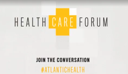 A graphic design for the Health Care Forum. It has a white background with a yellow cross in the center. The cross is made up of two lines one in black and the other in yellow. Above the cross there is text that reads "Health Care Forum" in a bold sans-serif font. Below the text it reads "Join the conversation #AtlanticHealth". The text is in a smaller black font and is centered on the image. The overall design is simple and modern.