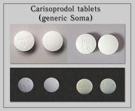 Four different types of carisoprodol tablets (generic Soma). The tablets are round and white in color. They are arranged in a horizontal row on a gray background. The first tablet on the top left is white with the word "CARISOPRODOL" written on it in black letters. The second tablet in the middle is white and has the letters "MP" and "18" written in black. The third tablet is also white and appears to be the same size as the first tablet. The fourth tablet is grey and has a round shape. The fifth tablet is black and is placed on a black surface. All the tablets appear to be new and unused.