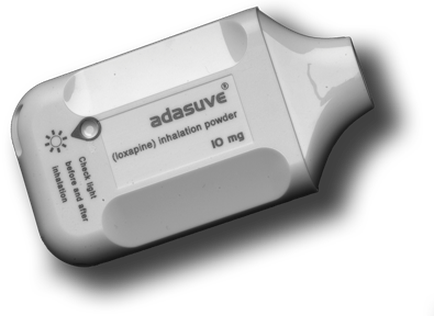 A black and white photograph of a white device with the brand name "adasuve" written on it. The device appears to be an inhalation powder as indicated by the text on the front of the device. The text reads "loraine (inhalation powder) 10 mg". There is also a small button on the top left corner that says "Check light before and after". The device has a curved shape with a small opening on the right side. The background is black making the device stand out.