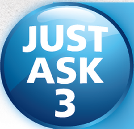 A blue circular button with the words "JUST ASK 3" written in white capital letters. The button appears to be made of a glossy material and has a smooth surface. The background is a solid blue color. The text is centered in the middle of the button and is slightly curved. The overall design is simple and modern.