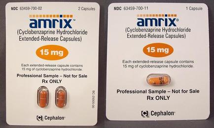 Two white cards with the Amrix logo and text on them. The cards are for two capsules one labeled "Cylobenzapine Hydrochloride Extended-Release Capsules" and the other labeled "15 mg". The cards also have the text "Professional Sample - Not for Sale Rx Only" and "cephalic" written on them indicating that the capsules contain 15 mg of cyclobenzaphine hydrochloride. The background of the cards is plain white.