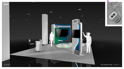 A 3D rendering of a trade show booth. The booth is set up in a dark room with a high ceiling and black walls. There are two white pillars on either side of the booth and a large screen in the center. The screen displays a blue and white color scheme and there are two people standing in front of it one of them is pointing towards the screen. There is also a small table and a chair in the booth. On the top right corner of the image there is a small image of a device with a curved design.