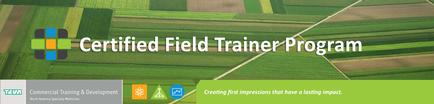 A banner for a Certified Field Trainer Program. The banner has a green background with a photo of a field in the center. The field is divided into different sections each with a different color and pattern. On the left side of the banner there is a logo for Commercial Training & Development on the top left corner and on the bottom right corner there are three icons representing different aspects of the program. The text on the banner reads "Certified Field Trainer" in white letters with the words "Creating first impressions that have a lasting impact" in smaller text below it.