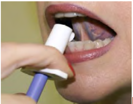 A close-up of a person's mouth with their mouth slightly open. The person is holding a blue toothbrush with a white cap in their hand. The toothbrush is being used to clean their teeth. The background is blurred so the focus is on the person and the toothbrush.