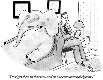 A black and white cartoon illustration of a man sitting on a chair in a room with an elephant. The man is wearing a suit and tie and is holding a book in his hand. The elephant is standing on its hind legs and is looking at the man with a curious expression. The room has a desk with a lamp and a picture frame on the wall. The text above the image reads "I'm right there in the room and no one even acknowledges me."