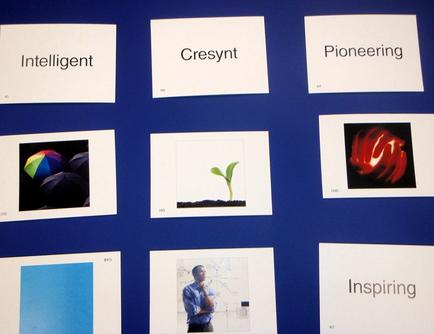 A collage of nine square photographs arranged in a grid-like pattern on a blue background. Each photograph is accompanied by a title that reads "Intelligent" "present" "Pioneering" and "Inspiring". The photographs are arranged in two rows and three columns. The first photograph on the top left shows a colorful umbrella the second photograph in the middle shows a plant with green leaves and the third photograph is of a red flower. The fourth photograph is a black and white photograph of a person standing in front of a computer screen. The fifth photograph is an illustration of a blue square with a white background. The sixth photograph is in the bottom right corner of the collage. The seventh photograph is on the bottom left corner and the eighth photograph is at the bottom center. All the photographs appear to be related to the concept of intelligent and pioneering.