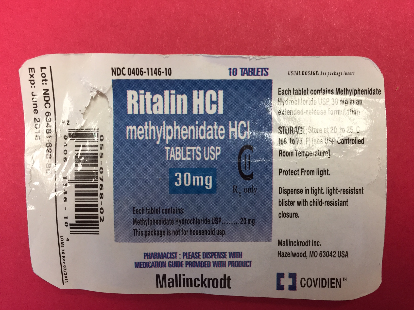 A photograph of a blister pack of Ritalin HCI methylphenidate HCI 30mg tablets. The blister pack is white with blue text and a barcode on the left side. The text on the blister pack reads "NDC 0406-1146-10" and "10 Tablets". The logos of Mallinckrodt and Covidien are at the bottom.