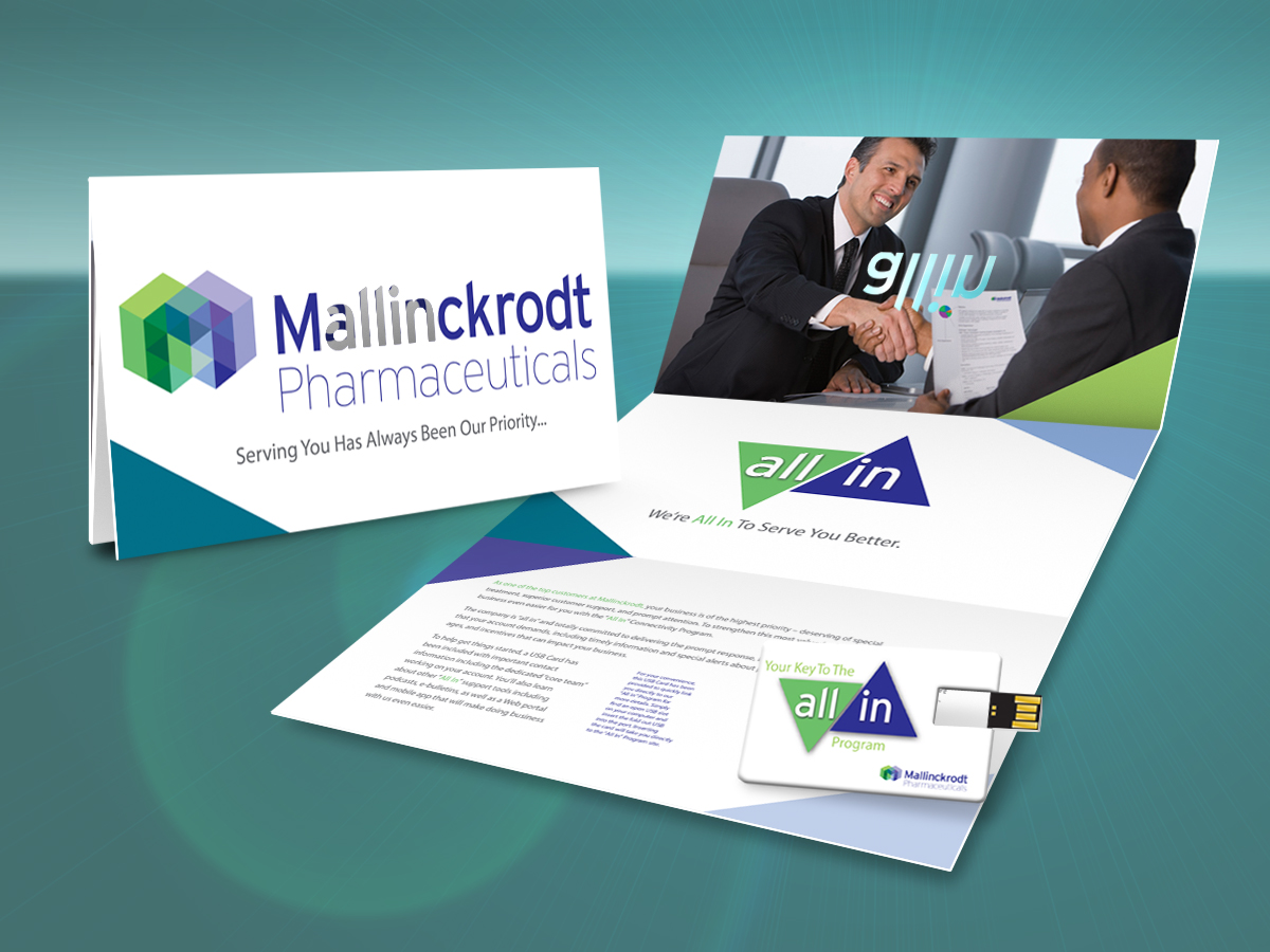 A brochure design for Mallinckrodt Pharmaceuticals. The brochure is divided into two sections. The left side of the brochure has a white background with the company's logo and text in blue and green colors. The logo is a hexagon with the letters "M" in the center and the text "Serving You Has Always Been Our Priority". The right side has a photo of two men shaking hands and smiling at each other. Below the photo there is text that reads "all in" in blue green and purple colors. <br /><br />The brochure also has a USB flash drive attached to it with the tagline "Your Key To The All In Program". The overall design is modern and professional with a clean and clean layout.