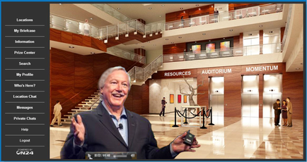A screenshot of a website with a photo of a man in a suit and tie standing in front of a large lobby. The lobby has a high ceiling with a staircase leading up to the second floor. The walls are made of wood and there are several large windows on the right side of the image. On the left side there is a menu bar with options such as "My Briefcase" "Information" "Prize Center" "Search" "My Profile" "Who's Here?" "Location Chat" "Messages" "Private Chat" and "Help". The man in the photo is smiling and holding a remote control in his hand. He appears to be giving a presentation or explaining something.