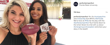 Two young women posing for a photo with a football. The woman on the left is blonde and is wearing a black tank top. She is holding the football in her left hand and is smiling at the camera. The other woman is brunette and is also smiling. Both women are wearing black tank tops and are standing in front of a white wall with a red banner that reads "Perfectly Imperfect Florida State University". On the right side of the image there is a tweet from the Twitter user "114 likes".