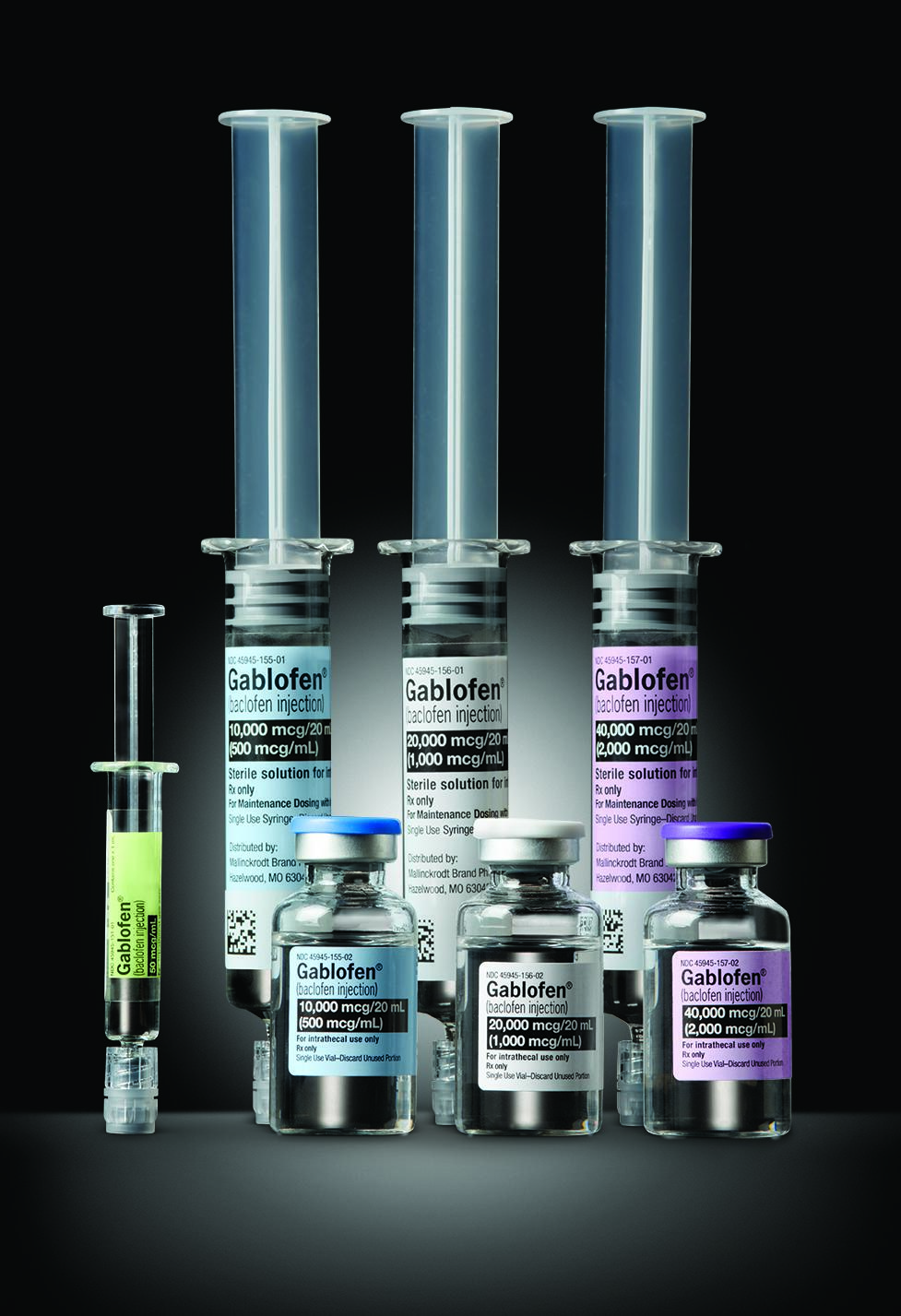 A three pairs of syringes and vials as well as an additional smaller syringe. All the syringes are made of clear glass or plastic and have a cylindrical shape. Each pair has a matching color scheme in blue white or purple. The smaller syringe has a green label. Each syringe and vial is labeled with "Gablofen" and each represents a dose between 50mcg and 40000 mcg. The background is black making the colors of the syringe and vials stand out.