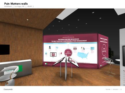 A 3D rendering of a room with a large pink and purple banner on the wall. The banner has the words "Pain Matters Walls" written in bold white letters at the top. Below the banner there is an image of a map of the United States with various icons and information about pain management. On the right side of the image there are two white chairs and a desk with a computer monitor on it. The room has wooden flooring and a wooden ceiling with recessed lighting. The overall design of the room is modern and professional.