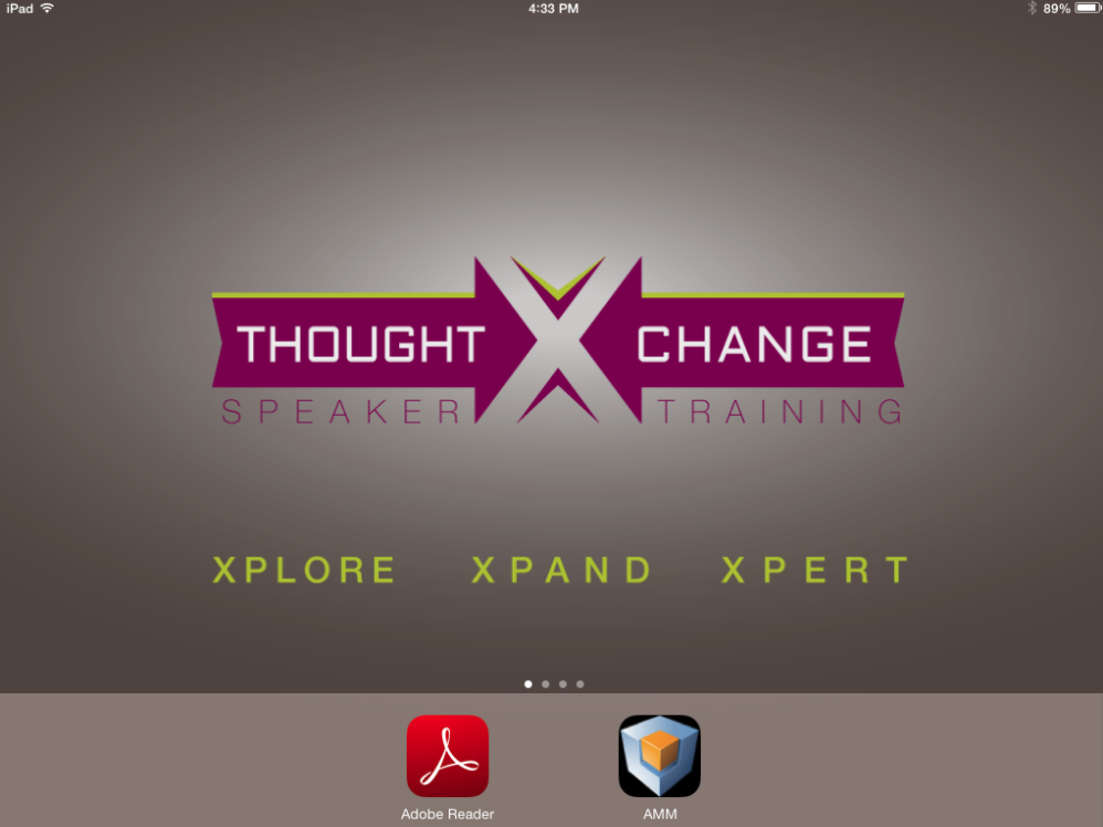 A screenshot form an iPad showing a logo for a speaker training program called "Thought X Change Speaker Training". The logo is in the center of the image and is a combination of green and purple colors. <br /><br />Below the text there are three words - "XPLORE" "XPAND" and "Xpert". Beneath the words there is the Adobe Reader app icon as well as an app icon for AMM.<br /><br />At the top of the screenshot there is a time and date bar indicating that the program is running on an iPad.