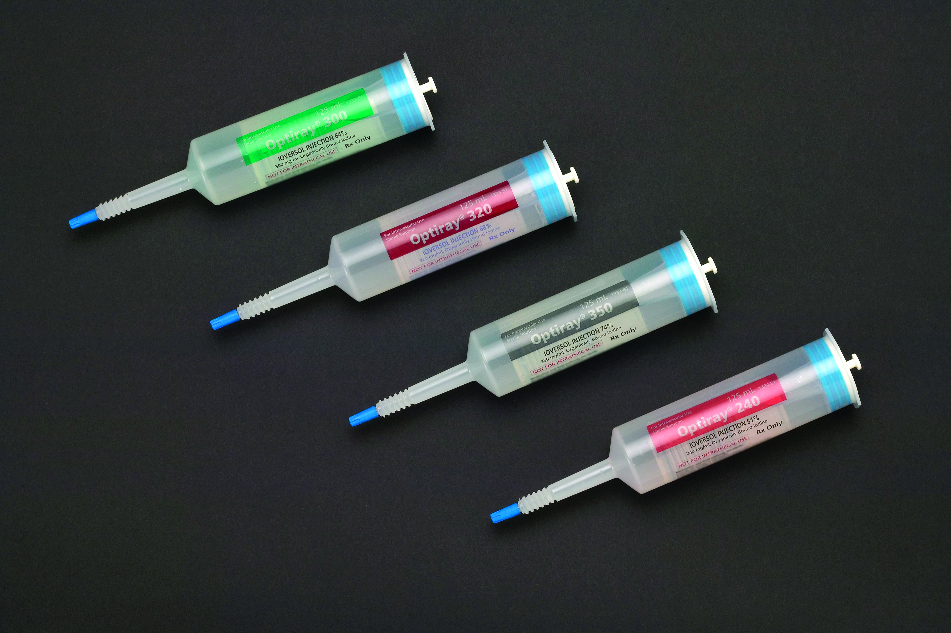 Four syringes of Optiray (ioversal injection) 125 mL of various concentrations. Shown are from top left to bottom right (arrange diagonally) : Optiray 300 (64% with 300 mg/mL organically bound iodine) Optiray 320 (68% with 320 mg/mL organically bound iodine) Optiray 350 (74% with 350 mg/mL organically bound iodine) and Optiray 240 (51% with 240 mg/mL organically bound iodine) 