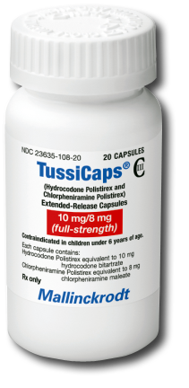 Of a white plastic bottle with a white cap. The label on the bottle is blue and white with the brand name "TussiCaps" written in bold letters at the top. Below the name there is product information which states that it is 10 mg/8 mg (full-strength) and contains 20 capsules. The bottle also mentions that the product is contraindicated for children under 6 years of age. The company name "Mallinckrodt" is also visible. The background of the label is white.