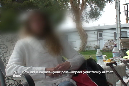 A person sitting on a patio chair with their back to the camera. The person is wearing a white sweater and has long blonde hair. They are holding hands and appear to be in a peaceful and relaxed state. In the background there is a tree and a white house. On the table in front of the person there are a few items such as a water bottle a plate of food and a red bag. The image is slightly blurred but it appears to be taken from a distance. The text on the image reads "INT: How did it impact-your-pain-impact your family at that time?"